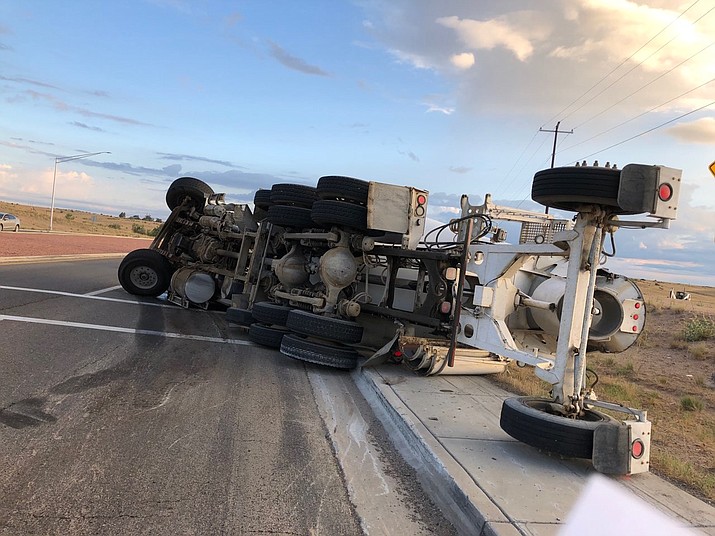 A cement truck's driver was cited after rolling his truck at the Deep Well Ranch Road roundabout on Friday morning, July 24, 2020. (PPD/Courtesy)