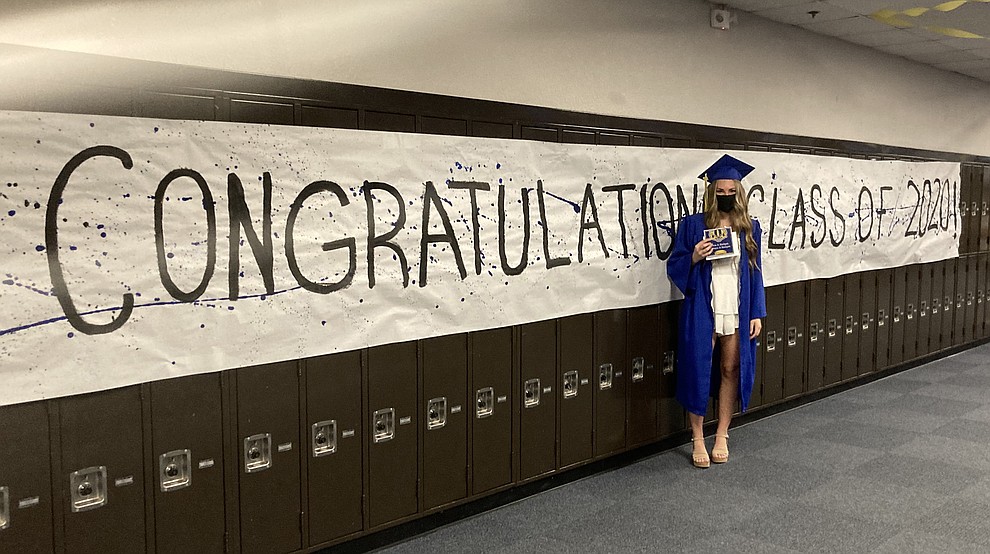 Prescott High School graduate Makenzie Ingallina poses in the school hallway at the Class of 2020 graduation Saturday, Aug. 8, 2020. (Nanci Hutson/Courier)