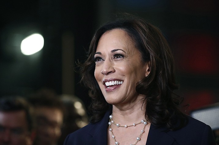 In this June 27, 2019, file photo, then-Democratic presidential candidate Sen. Kamala Harris, D-Calif., listens to questions after the Democratic primary debate hosted by NBC News at the Adrienne Arsht Center for the Performing Art in Miami. Joe Biden named  Harris as his running mate on Tuesday, making history by selecting the first Black woman to compete on a major party's presidential ticket. (Brynn Anderson, AP file)