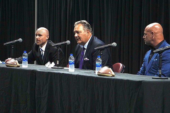 A panel including Findlay Toyota Center General Manager Shane Cadwell, left, S&P Sports President Trey Medlock, middle, and Indoor Football League Commissioner Todd Tryon speak to the crowd during a press conference Tuesday, Aug. 25, 2020, in which the IFL officially announces that a new indoor football franchise will be coming to Prescott Valley. (Aaron Valdez/Courier)