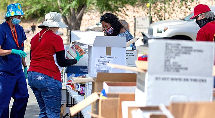Earlier this year, as part of Public Service Recognition Week, the Nothern Arizona VA Health Care collected and delivered 4,500 pounds  of food, cleaning supplies and water to 80 veteran families of the Hopi Tribe and Tewa people. (Photo courtesy of U.S. Dept. of Veteran Affairs)