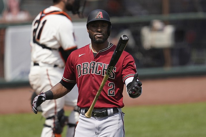 Arizona Diamondbacks' Starling Marte flips his bat after striking out against the San Francisco Giants during the fourth inning of a baseball game in San Francisco, Sunday, Aug. 23, 2020. (Jeff Chiu/AP, file)
