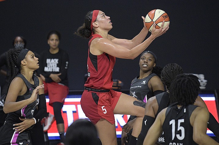 Las Vegas Aces forward Dearica Hamby goes up for a shot during the first half of the team's WNBA basketball game against the Dallas Wings, Tuesday, Aug. 25, 2020, in Bradenton, Fla. (Phelan M. Ebenhack/AP)