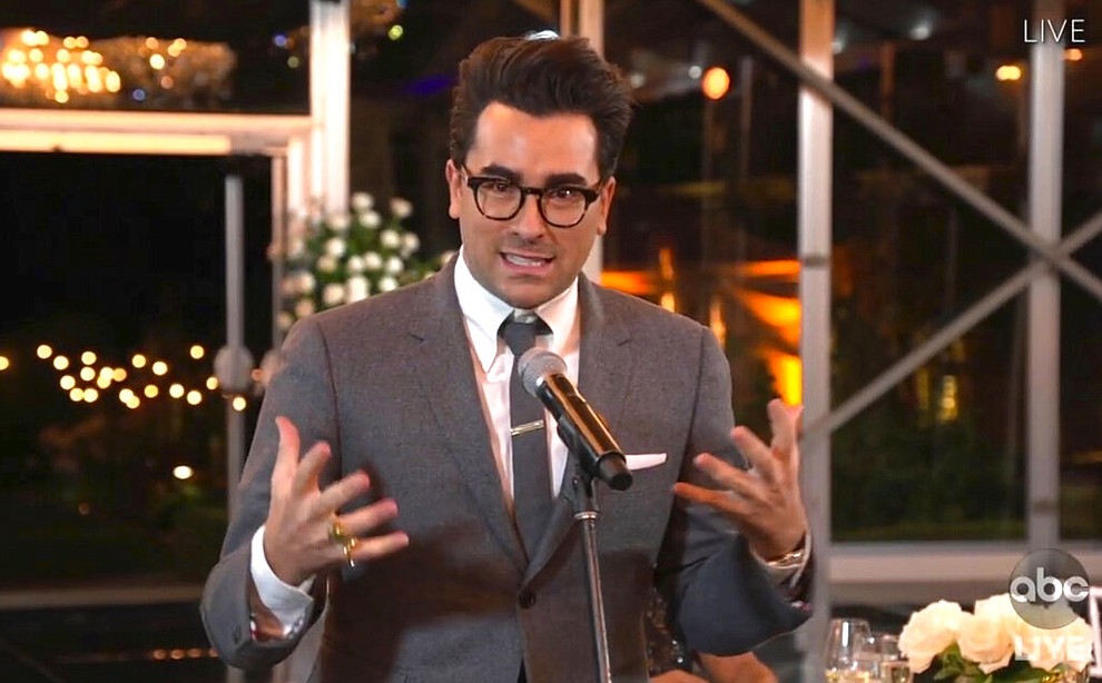 In this video grab captured on Sept. 20, 2020, courtesy of the Academy of Television Arts & Sciences and ABC Entertainment, Daniel Levy accepts the award for outstanding writing for a comedy series for "Schitt's Creek" during the 72nd Emmy Awards broadcast. (The Television Academy and ABC Entertainment via AP)