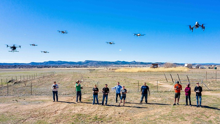 Yavapai College students watch their drones hover in the air for a program that has been selected to use for training by the Federal Aviation Administration (Yavapai College/Courtesy)