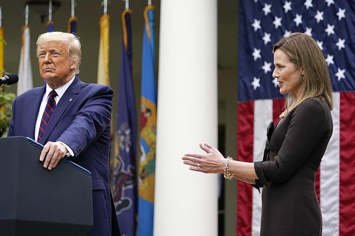 Judge Amy Coney Barrett applauds as President Donald Trump announces Barrett as his nominee to the Supreme Court, in the Rose Garden at the White House, Saturday, Sept. 26, 2020, in Washington. (Alex Brandon/AP)