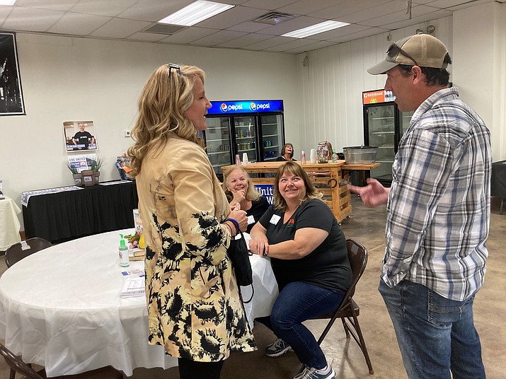 The new United Way of Yavapai County Executive Director Patty Bell-Demers, left, speaking to Prescott Valley Mayor Kell Palguta, right, at the first campaign “road show” hosted at the Prescott Rodeo Grounds on Friday, Sept. 25, 2020. (Nanci Hutson/Courier)