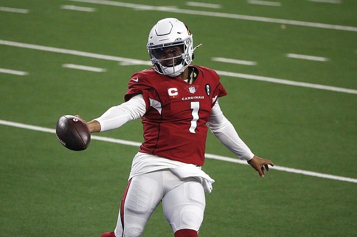 Arizona Cardinals' Kyler Murray celebrates running the ball for a touchdown in the second half of an NFL football game against the Dallas Cowboys in Arlington, Texas, Monday, Oct. 19, 2020. (Michael Ainsworth/AP)