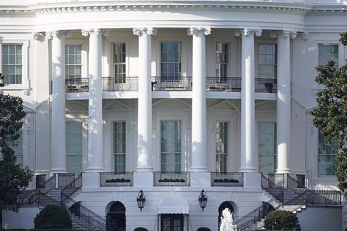 In this Oct. 5, 2020 file photo, the White House is shown Monday afternoon, Oct. 5, 2020, in Washington. President Donald Trump and Democratic rival Joe Biden’s campaigns are assembling armies of powerful lawyers as they prepare for the possibility that the race for the White House is decided not at the ballot box but in court. (J. Scott Applewhite/AP)