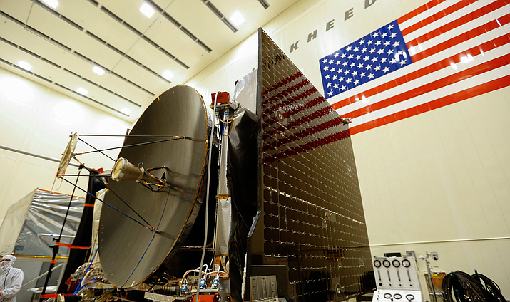 Final assembly in 2015 of the OSIRIS-REx spacecraft, which launched in 2016. University of Arizona teams had been working on the project for more than a decade when it reached a near-Earth asteroid, Bennu, this week and executed a touch-and-go mission to briefly “tag” the surface, collect soil samples and head back to orbit. (Photo courtesy Lockheed Martin)