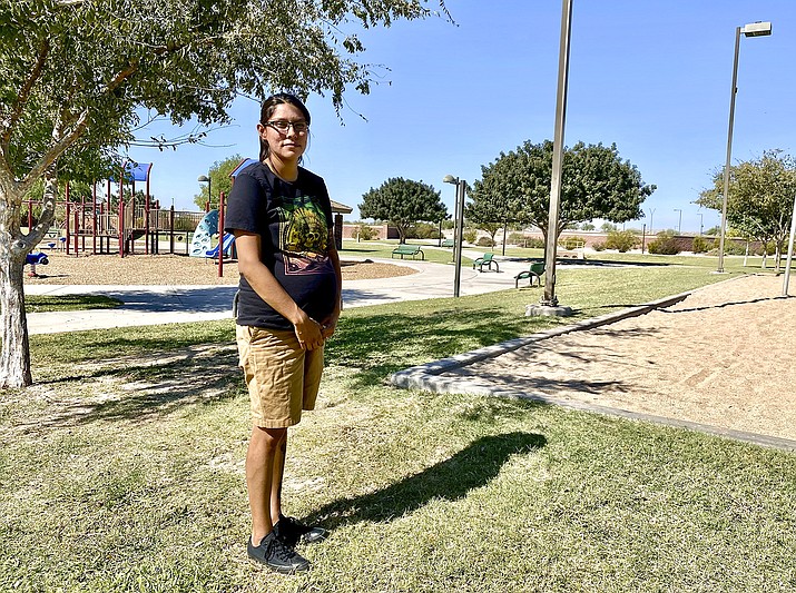 Briana Almond, of Buckeye is 35 weeks pregnant and due Nov. 24. The 25-year-old Navajo woman had planned to deliver her baby at the Phoenix Indian Medical Center but is now devising a new plan after learning the hospital shut down its birthing center. She says hospital staff recommended she deliver her baby at the Tuba City Regional Health Care, another Indian Health Service facility more than 200 miles away. (Dalton Walker/Indian Country Today via AP)