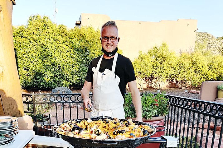 Dine in Master Chef John Romagli serving Paella at SVP Fundraiser.