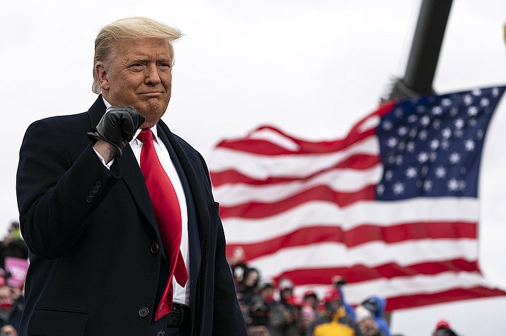 President Donald Trump arrives to speak at a campaign rally at Oakland County International Airport, Friday, Oct. 30, 2020, at Waterford Township, Mich. (AAlex Brandon/AP)