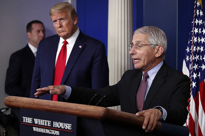 In this April 22, 2020, file photo, President Donald Trump listens as Dr. Anthony Fauci, director of the National Institute of Allergy and Infectious Diseases, speaks about the coronavirus in the James Brady Press Briefing Room of the White House in Washington. (AP Photo/Alex Brandon, File)