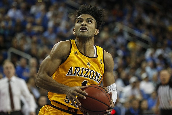 In this Feb. 27, 2020, file photo, Arizona State guard Remy Martin (1) drives to basket against UCLA during an NCAA college basketball game in Los Angeles. Martin has made The Associated Press 2020-21 preseason All-America team, announced Wednesday, Nov. 11. (Ringo H.W. Chiu, AP File)
