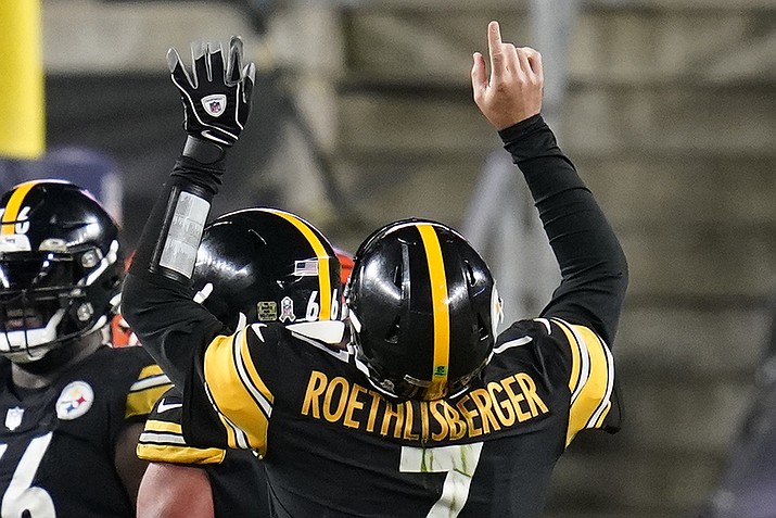 Pittsburgh Steelers quarterback Ben Roethlisberger (7) celebrates a touchdown pass to wide receiver Chase Claypool during the second half of an NFL football game against the Cincinnati Bengals, Sunday, Nov. 15, 2020, in Pittsburgh. (AP Photo/Keith Srakocic)