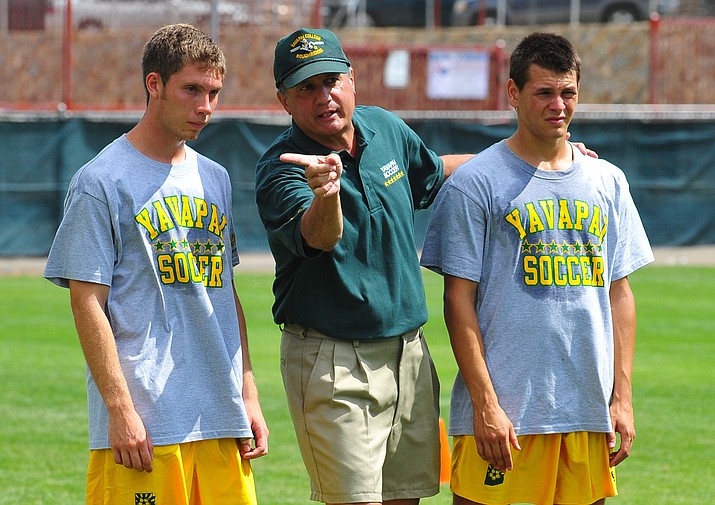 Yavapai College head men’s soccer coach Mike Pantalione instructs two players during a practice in 2011. Pantalione, the all-time winningest junior college men’s soccer coach, has said he will retire after 32 seasons in January. (Courier file photo)