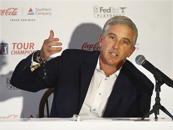 In this Sept. 2 2020 file photo, PGA Tour commissioner Jay Monahan holds a live press conference with the media during the season-ending Tour Championship at East Lake Golf Club, in Atlanta. The PGA Tour and European Tour have announced an alliance on Friday, Nov. 27, that could be the start of a global schedule. Part of the alliance has the PGA Tour acquiring a minority share in European Tour Productions. (Curtis Compton/Atlanta Journal-Constitution via AP)