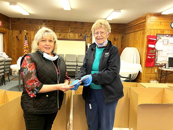 The volunteer group packaged 30 boxes this year. (Wendy Howell/WGCN)