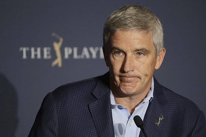 PGA Tour Commissioner Jay Monahan reacts to a question during a news conference at The Players Championship golf tournament in Ponte Vedra Beach, Fla., in this Friday, March 13, 2020, file photo. Monahan says tournaments next year are prepared to break even without the return of fans. (Chris O'Meara, AP File)
