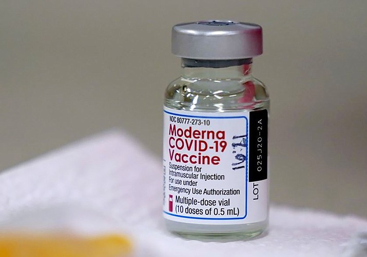 A vial of the Moderna COVID-19 vaccine — the type being administered in Yavapai County — sits ready for use. (Charlie Riedel/AP, file)