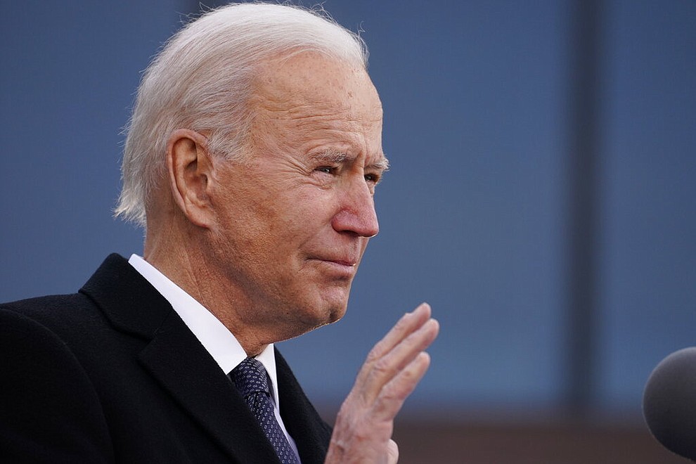 President-elect Joe Biden speaks at the Major Joseph R. "Beau" Biden III National Guard/Reserve Center, Tuesday, Jan. 19, 2021, in New Castle, Del. (AP Photo/Evan Vucci)