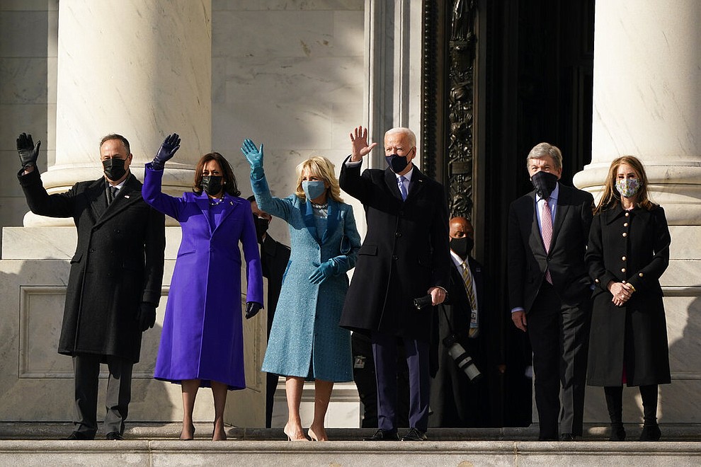 President-elect Joe Biden, his wife Jill Biden and Vice President-elect Kamala Harris and her husband Doug Emhoff arrive at the steps of the U.S. Capitol for the start of the official inauguration ceremonies, in Washington, Wednesday, Jan. 20, 2021. (AP Photo/J. Scott Applewhite)