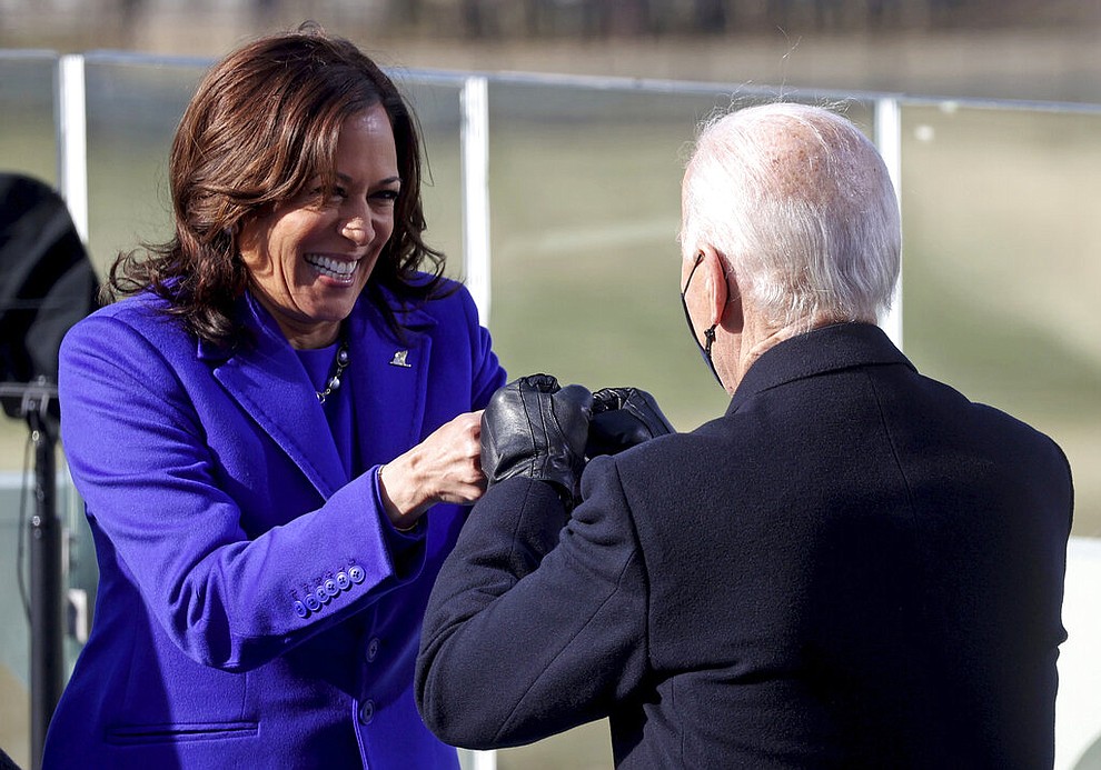 Vice President Kamala Harris bumps fists with President-elect Joe Biden after she was sworn in during the inauguration, Wednesday, Jan. 20, 2021, at the U.S. Capitol in Washington. (Jonathan Ernst/Pool Photo via AP)