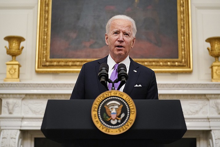 President Joe Biden speaks about the coronavirus in the State Dinning Room of the White House, Thursday, Jan. 21, 2021, in Washington. (Alex Brandon/AP)