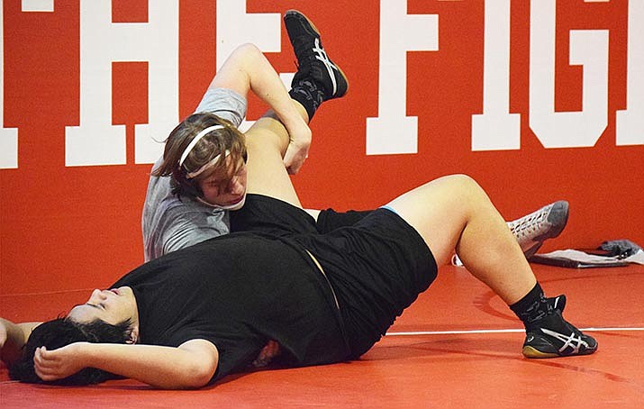 Mingus Union wrestlers Tyler Griffin, right, and teammate Avery Hines, left, were both part of the Marauders’ season-opening win at Marcos de Niza in Tempe on Wednesday. The Marauders are set to host Wednesday, Jan. 27 and Saturday, Jan. 30 duals, both at 5 p.m. VVN/Jason W. Brooks