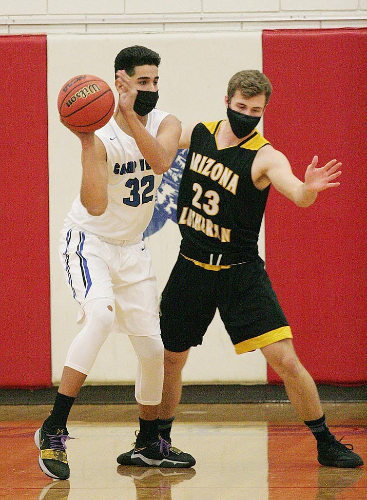 Camp Verde sophomore Chito Herrera (No. 32), pictured Monday against Arizona Lutheran, pulled down six rebounds Thursday against Payson. VVN/Bill Helm