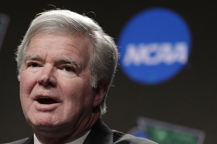 In this April 4, 2019 photo, NCAA President Mark Emmert answers questions during a news conference at the Final Four college basketball tournament in Minneapolis. The NCAA has delayed a potential landmark vote on legislation that would permit college athletes to be compensated for their fame for the first time after the association received a warning from the Department of Justice about potential antitrust violations. (Matt York/AP, File)