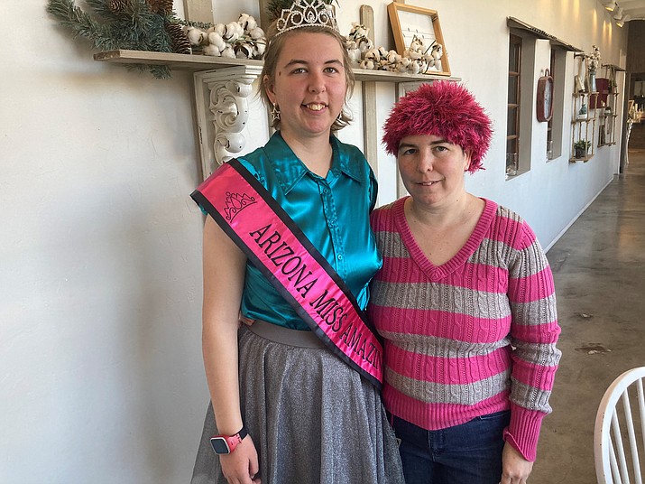 Beth Vicory wearing her Arizona Miss Amazing 2020 pageant sash next to mom Suzanne Vicory. (Nanci Hutson/Courier)