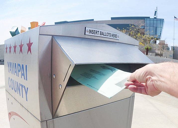 A Yavapai County voter drops off a ballot. Senate Republicans are moving to approve new restrictions on the ability of county recorders to conduct voter registration drives. (Courier file photo)