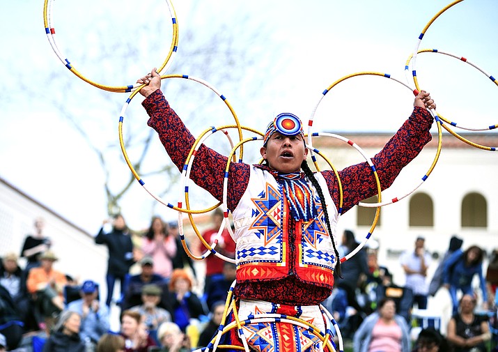 Scott Sixkiller Sinquah, who is Gila River Pima, Hopi, Cherokee and Choctaw, performs at the annual Heard Museum World Championship Hoop Dance Contest in Phoenix, Feb. 9, 2020. Hoop dancing has rarely ever been about competition for the world champion Sinquah. He does it to pay homage to traditional healing aspects of the dancing the style is known for. He also dances for his fellow dancers and that friendly connection that's been missing since the pandemic hit. (Jared Platt/Heard Museum via AP)
