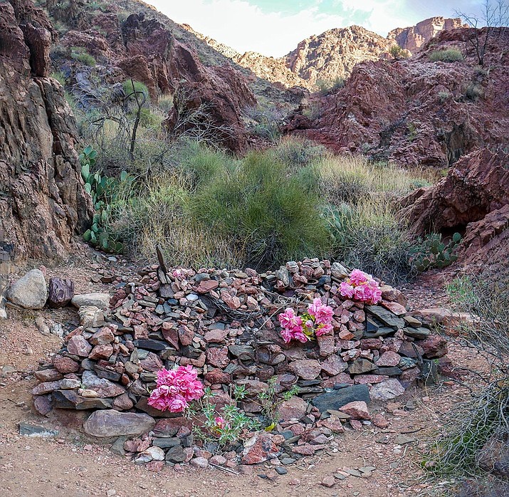 The gravesite of Kaibab Trail Foreman Rees B. Griffiths is located on the north side of the Colorado River, between the Black Bridge and the mouth of Bright Angel Canyon. Griffiths died on Feb. 6, 1922 during a blasting accident. (Photo/NPS)