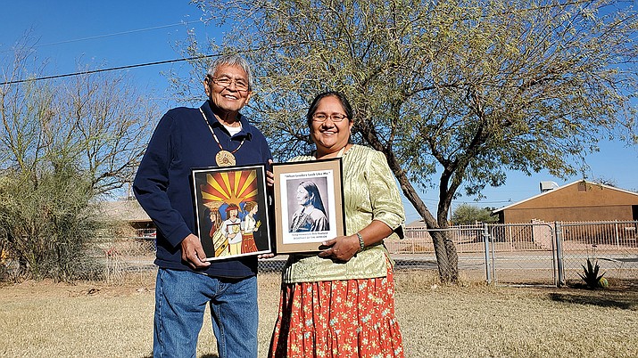 This photo provided by Debbie Nez-Manuel shows her husband, Royce Manuel, left and Nez-Manuel at their home at the Salt River-Pima Maricopa Community northeast of Phoenix on Saturday, Feb. 20, 2021. The couple will be among Native Americans who will be closely watching the confirmation hearing for Deb Haaland, a New Mexico congresswoman who has been nominated to lead the U.S. Department of the Interior, on Tuesday, Feb. 23, 2021. (Debbie Nez-Manuel via AP)
