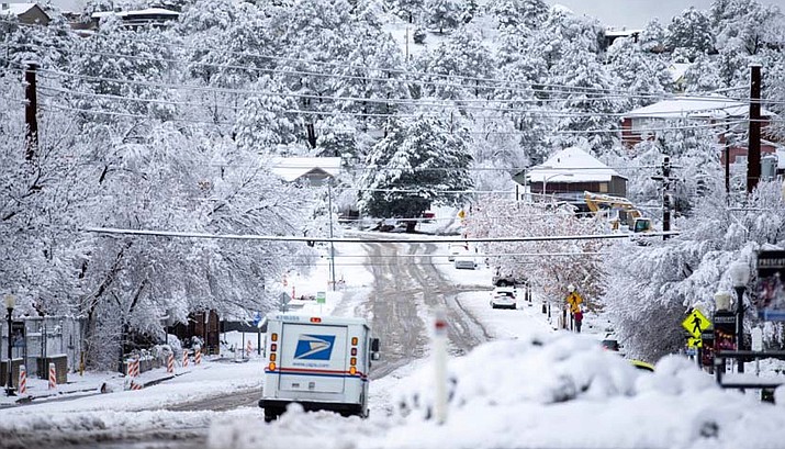 A Postal Service mail truck makes its way through Prescott streets during the January 2021 snow storms. (City of Prescott/Courtesy)