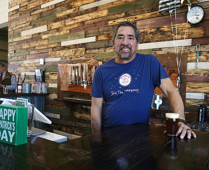 Rob Valenzuela manning the bar at his business Insurgent Brewing Co. in Chino Valley on Thursday, March 18, 2021. Insurgent Brewing Co. was named the first-ever winner of the Makeover of a Lifetime as part of the Yavapai College Small Business Development Center’s (SBDC) new Small Business Makeover program. (Aaron Valdez/Review)