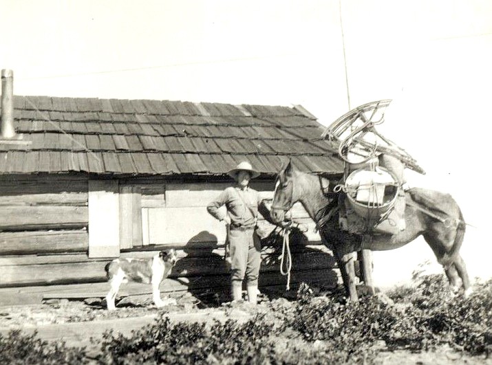 Hallie Daggett, the first female fire lookout with her horse and dog, Eddy. This photo was taken in 1913. (U.S. Forest Service - Kaibab National Forest)