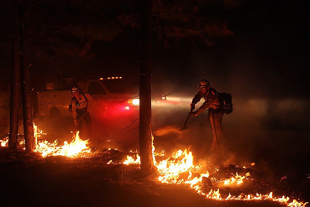 Firefighters work through the night on the 2020 Mangum Fire.