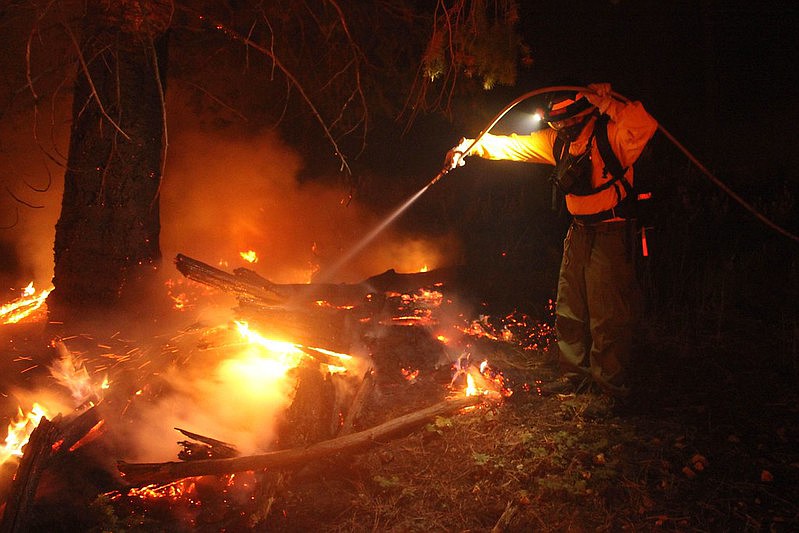 Firefighters work through the night on the 2020 Mangum Fire.