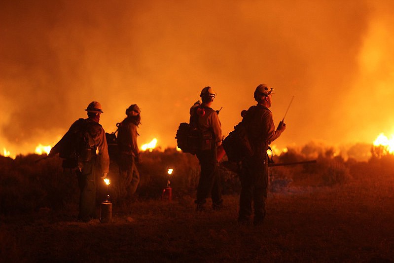Firefighters work through the night on the 2020 Mangum Fire.