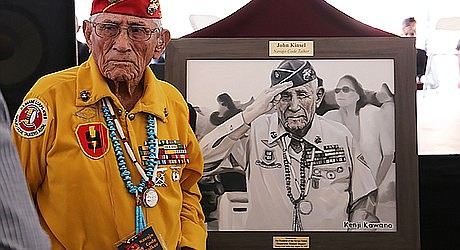 Navajo Code Talker John Kinsel stands next to an oil portrait based on a photograph by Kenji Kawano. The Office of the President and Vice President provided these portraits as gifts for the surviving Navajo Code Talkers. (Office of the President and Vice President)