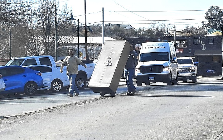Workers move equipment out of the building the city has been using for its finance and human resources departments on a recent morning. A Cottonwood Council meeting is set for 6 p.m. Tuesday. VVN/Jason W. Brooks