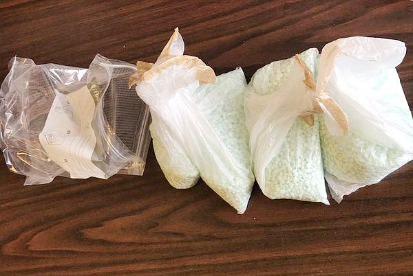 Some of the nearly 20,000 pills containing fentanyl discovered by a Yavapai County Sheriff’s deputy Thursday, April 1, 2021, hidden in an SUV’s storage compartment, according to a news release. (YCSO)