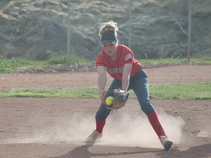 Mingus Union third baseman Mallorie Copeland scoops up a ground ball in the Marauders’ April 1 win over Flagstaff. The Marauders improved to 7-0 with the win. VVN/Jason W. Brooks
