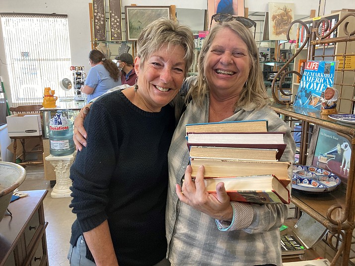In this undated photo, Friends Donna Schmidt, left, and Julie Cave, shopping in the NOAH thrift store in downtown Prescott. (Nanci Hutson/Courier)