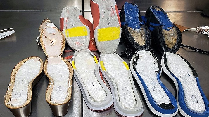 Customs officers at the Atlanta airport stopped a 21-year-old woman last week after she arrived on a flight from Jamaica. Her bags were inspected, and seven pairs of shoes were found to have $40,000 worth of cocaine hidden in the soles. (U.S Customs and Border Protection)