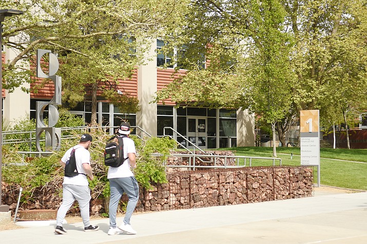 Two students walk to class at Yavapai College on Tuesday, May 4, 2021, in Prescott. (Jesse Bertel/Courier)